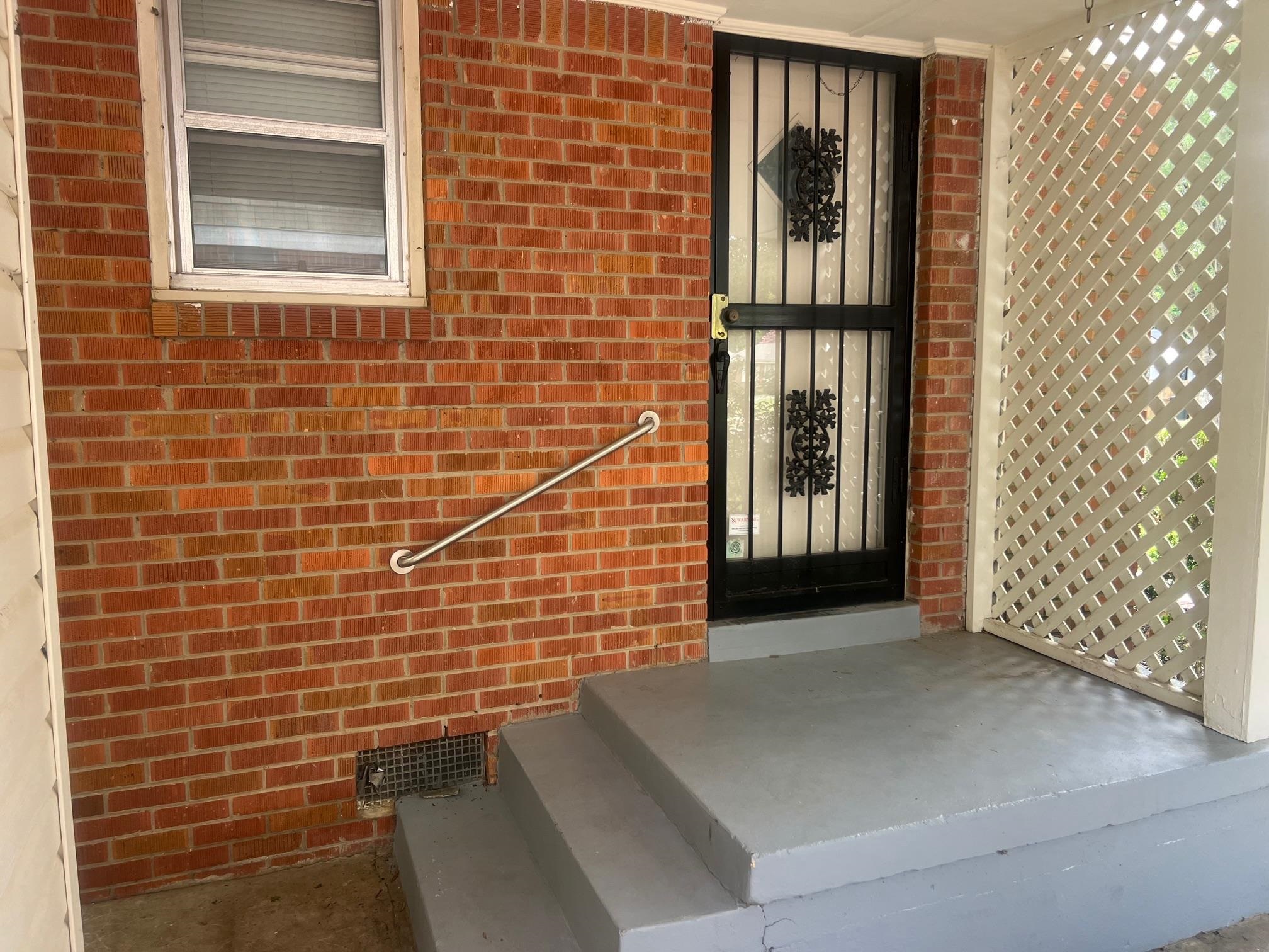 5048 Kaye Road Memphis, TN 38117 - Photo 16 of 19 a view of front door of house and window