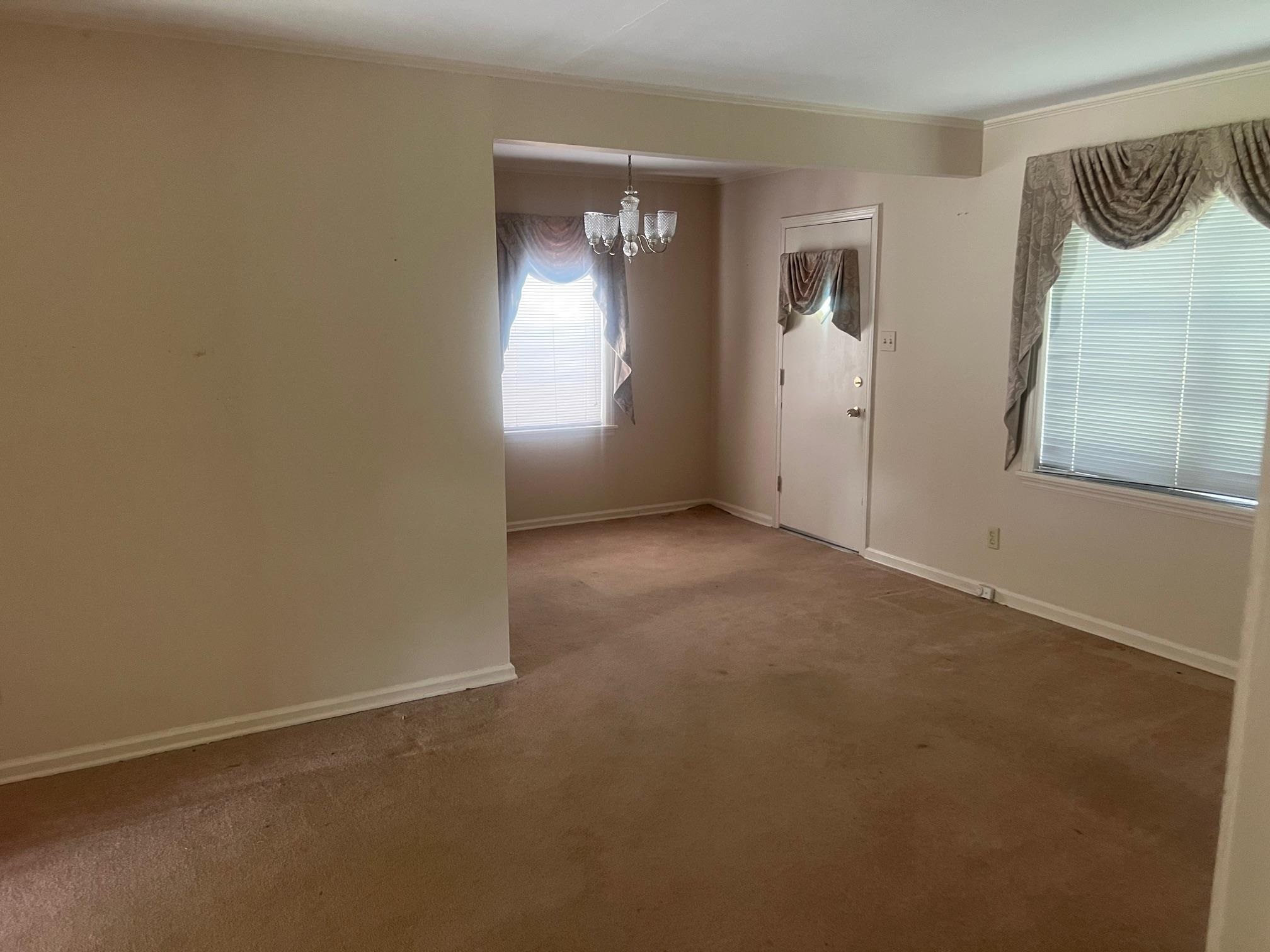 5048 Kaye Road Memphis, TN 38117 - Photo 3 of 19 an empty room with windows and closet
