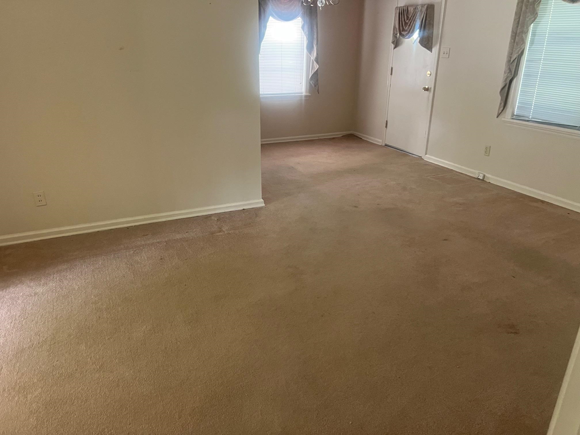 5048 Kaye Road Memphis, TN 38117 - Photo 9 of 19 an empty room with windows