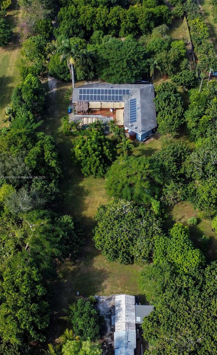 37225 Southwest 214th Avenue Homestead, FL 33034 - Photo 56 of 75 an aerial view of a house with a yard