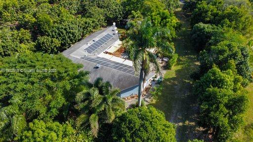 37225 Southwest 214th Avenue Homestead, FL 33034 - Photo 59 of 75 an aerial view of a house with a yard