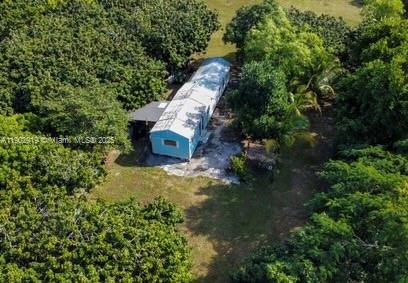 37225 Southwest 214th Avenue Homestead, FL 33034 - Photo 60 of 75 an aerial view of a house with a yard