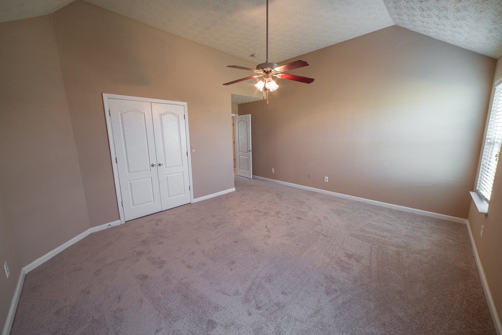 45 Apache Trail Fort Mitchell, AL 36856 - Photo 42 of 43 a view of a chandelier fan and a fire place