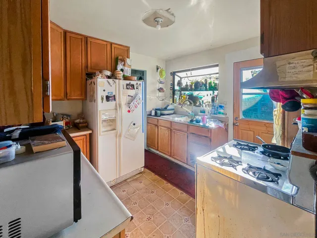 a bathroom with a sink a toilet and a bathtub