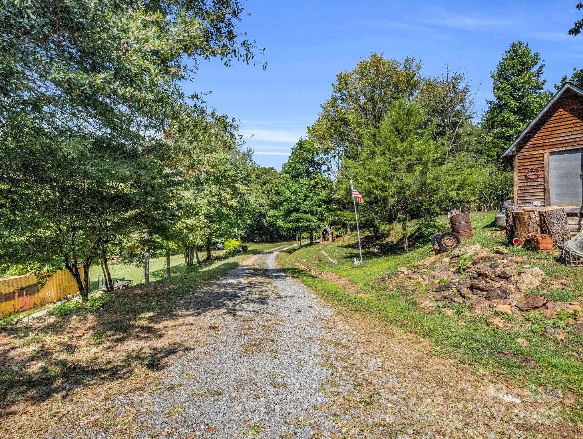 282 Reagan Lane Bostic, NC 28018 - Photo 22 of 34 a view of backyard of house with green space
