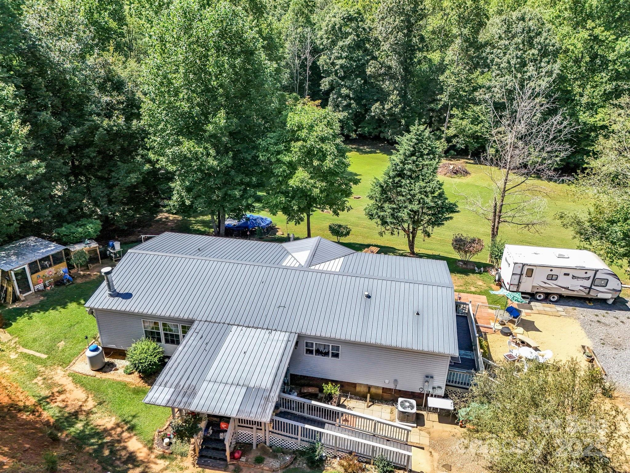 282 Reagan Lane Bostic, NC 28018 - Photo 25 of 34 an aerial view of a house with garden space and street view