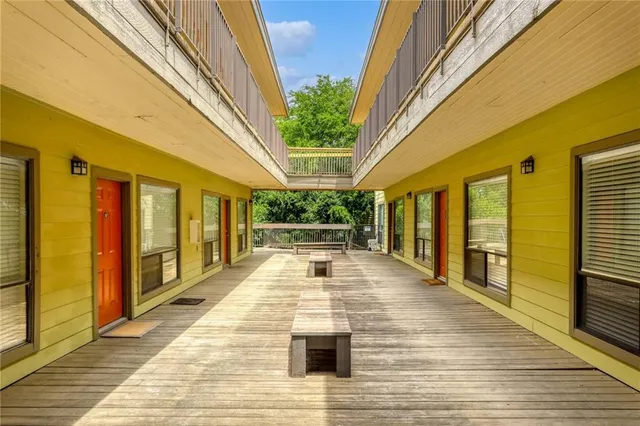 a view of swimming pool with seating area