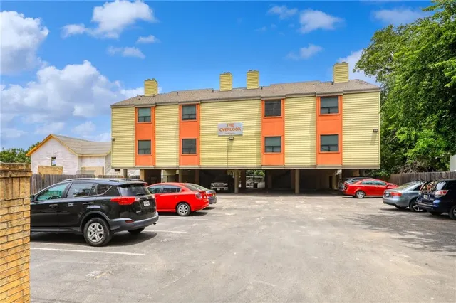 a car parked in front of a house
