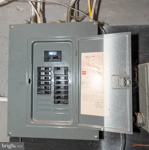 a backyard of a house with outdoor seating