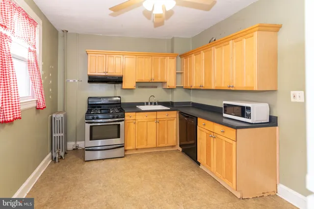 a view of walk in closet with window