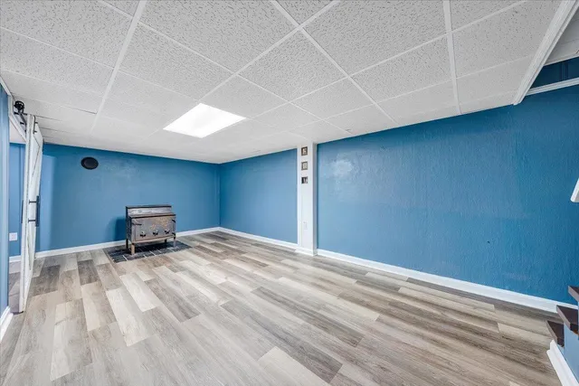 a room with a bed and a walk in closet