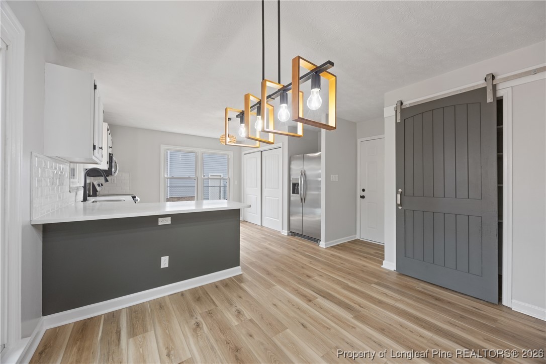 610 Duncan Road Spring Lake, NC 28390 - Photo 11 of 34 a view of a bathroom with a sink and mirror