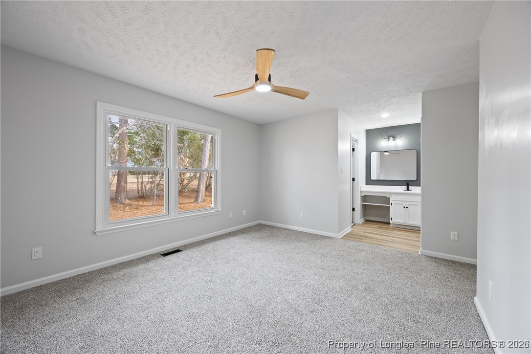 610 Duncan Road Spring Lake, NC 28390 - Photo 19 of 34 a view of an empty room with a window