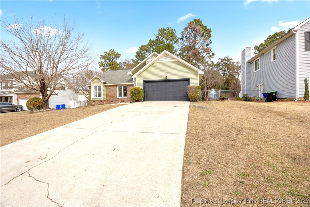 610 Duncan Road Spring Lake, NC 28390 - Photo 2 of 34 a front view of a house with a yard