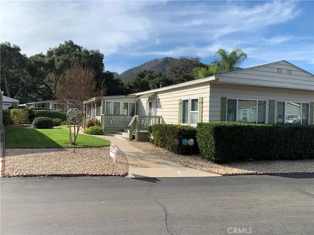 a house view with a garden space