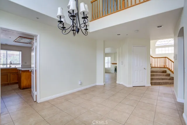 a view of a hallway with a kitchen