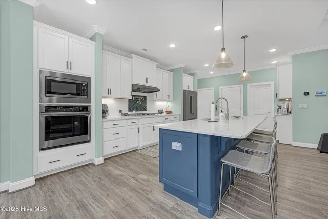 $889,995 | 3364 Stone Crab Court Southwest, Supply, NC 28462