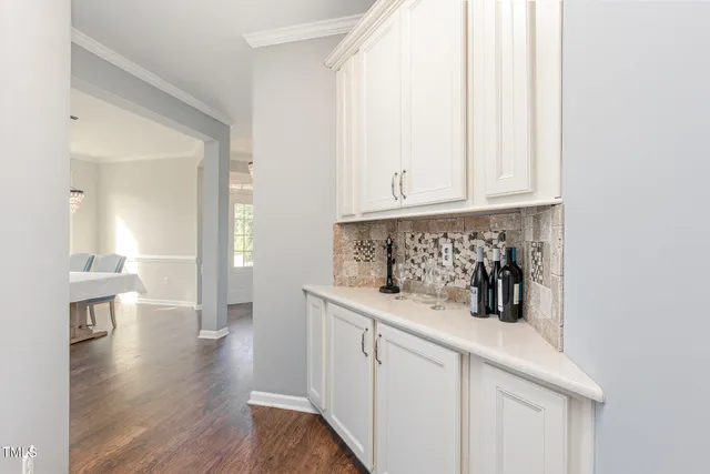 a view of a kitchen from the hallway