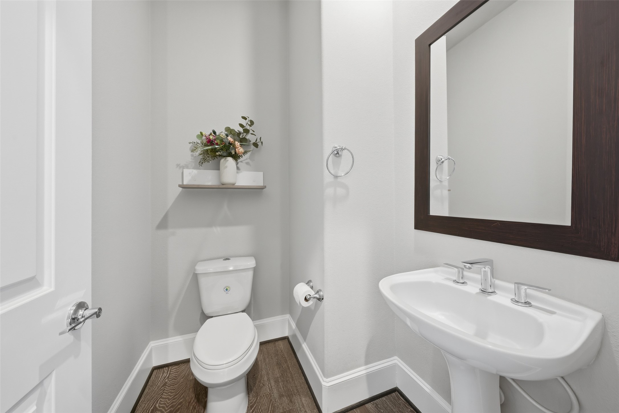 8612 Emnora Lane Houston, TX 77080 - Photo 22 of 45 a bathroom with a toilet sink and mirror