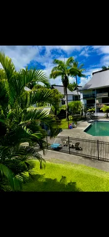 a view of a swimming pool with an outdoor space