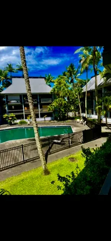 a view of swimming pool with outdoor seating