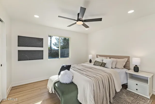 a bedroom with a bed and window