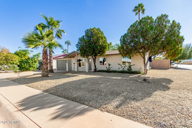 a house view with a garden space