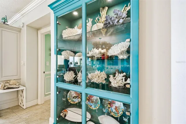 a bathroom with a granite countertop sink mirror vanity and toilet