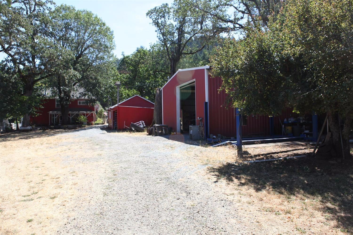 359 Old Stage Rd Road Wolf Creek, OR 97497 - Photo 5 of 35 Shop 2 car carport and 2 car garage and