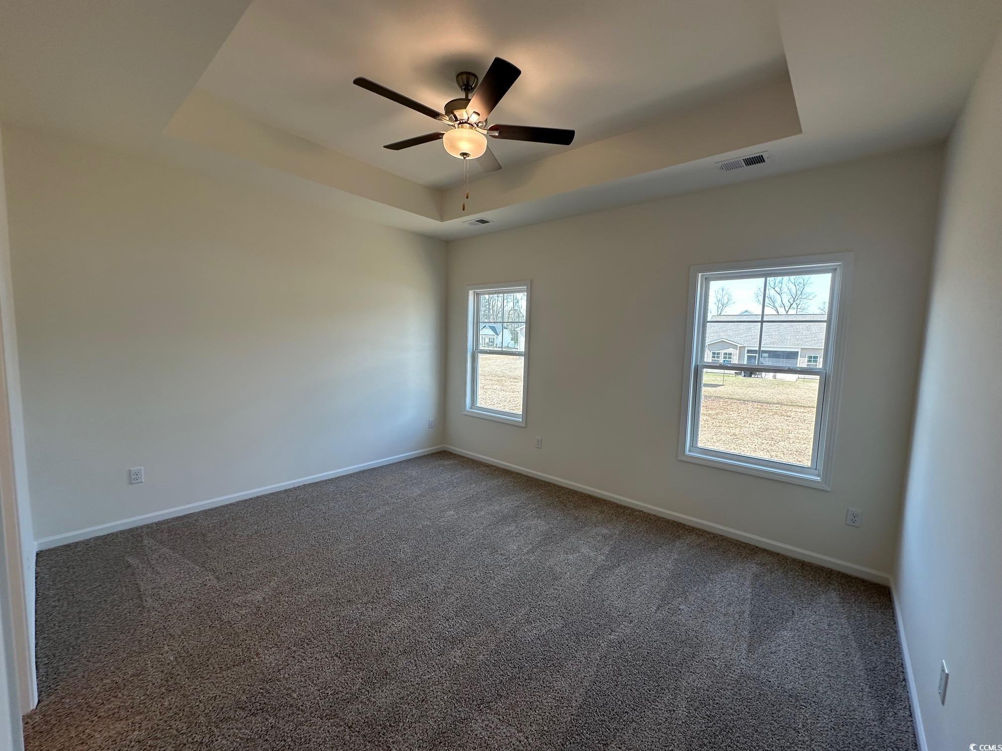 541 Honeyhill Loop Conway, SC 29526 - Photo 13 of 32 Carpeted empty room with visible vents, a ceiling