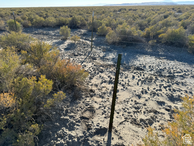 6000 North 10000th West Delta, UT 84624 - Photo 6 of 20 Aerial view of property and surrounding area featuring a forest