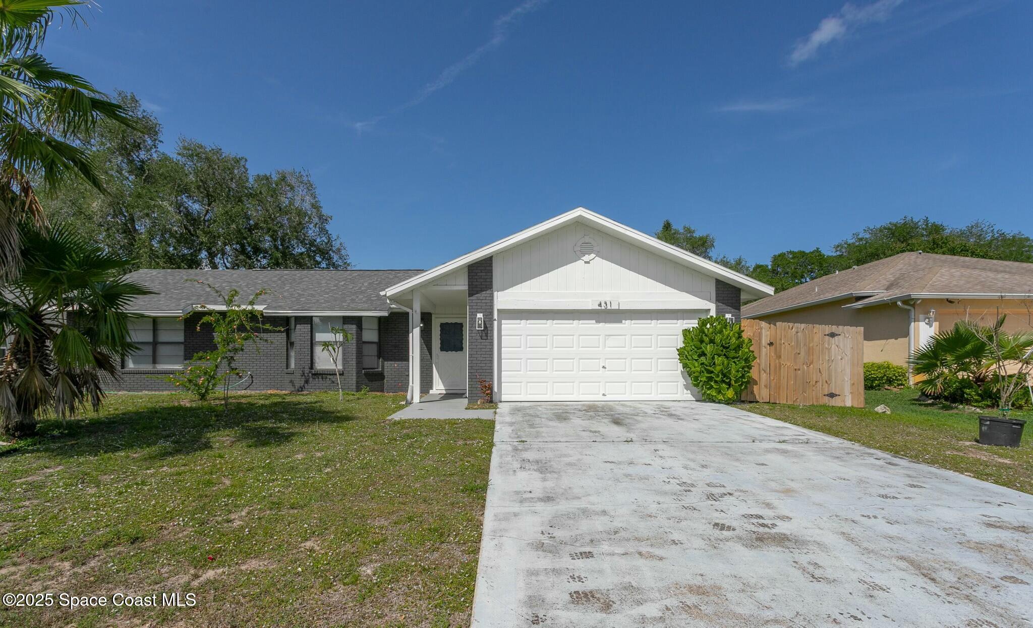 431 Abello Road Southeast Palm Bay, FL 32909 - Photo 1 of 22 Front of home