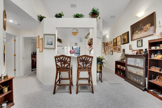 a bedroom with a bed and flat screen tv