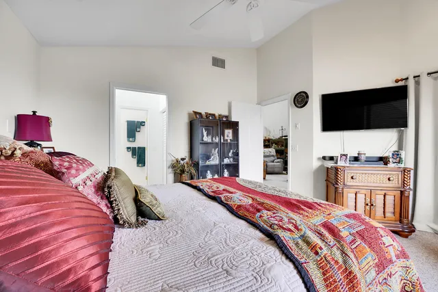 a bathroom with a glass shower door