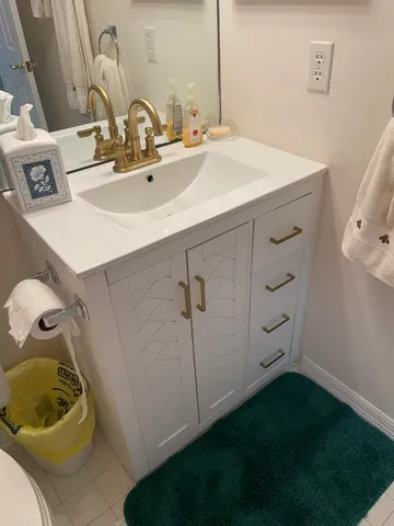 a room with wooden cabinets