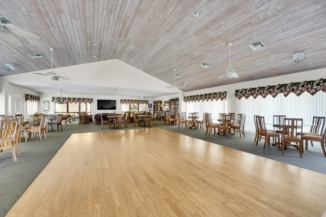 a view of a balcony with chairs