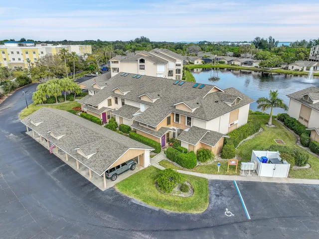 a view of a lake with a yard and lake view