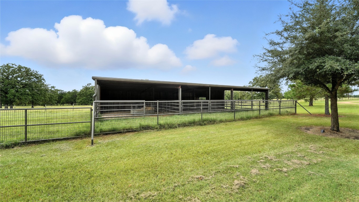 705 Antioch Road Paige, TX 78659 - Photo 11 of 40 a view of a field with sitting area