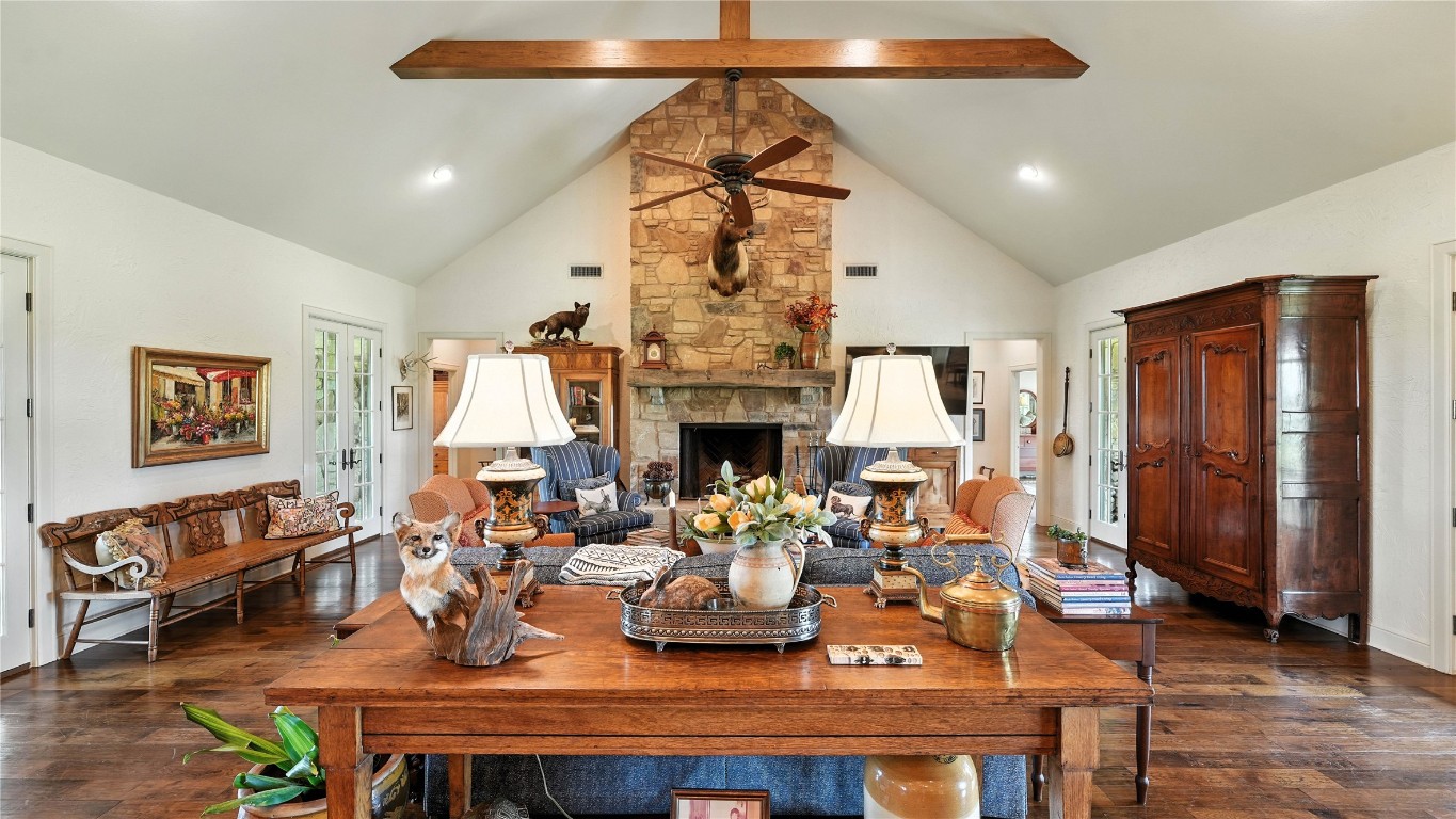 705 Antioch Road Paige, TX 78659 - Photo 20 of 40 a living room with fireplace furniture and a window