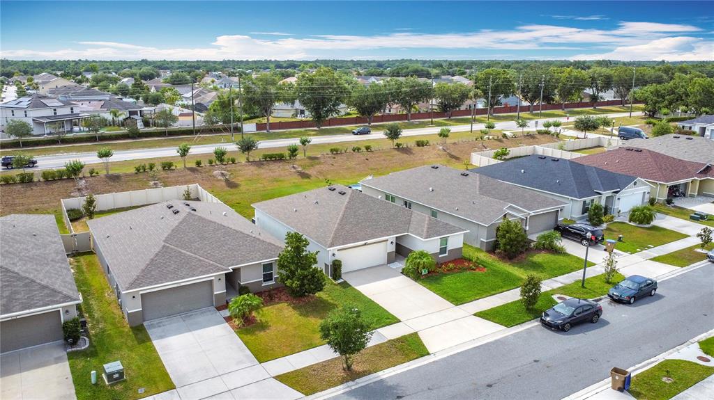 3216 Casa Del Rey Avenue Kissimmee, FL 34746 - Photo 32 of 32 an aerial view of residential houses with outdoor space and swimming pool