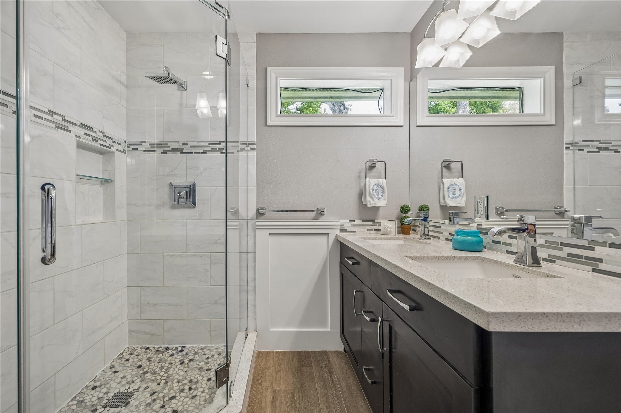 1018 Ben Hur Drive Spring Valley Village, TX 77055 - Photo 18 of 30 Primary bath with a glass enclosed shower, dual sinks and quartz countertops.