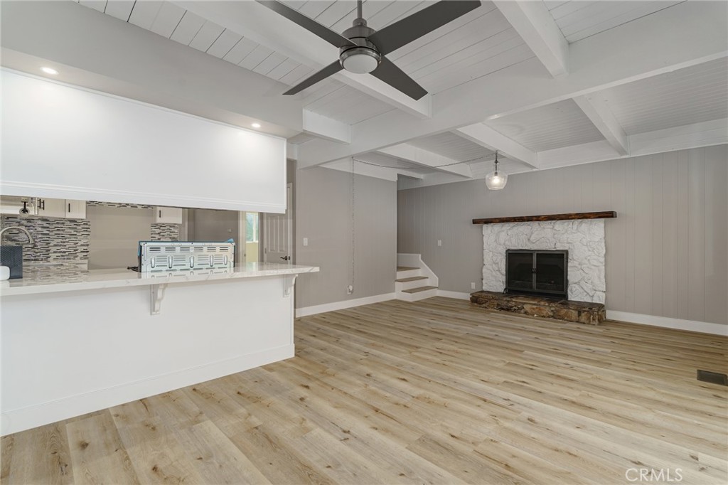 1106 Grass Valley Road Lake Arrowhead, CA 92352 - Photo 22 of 57 a view of an empty room with window and wooden floor