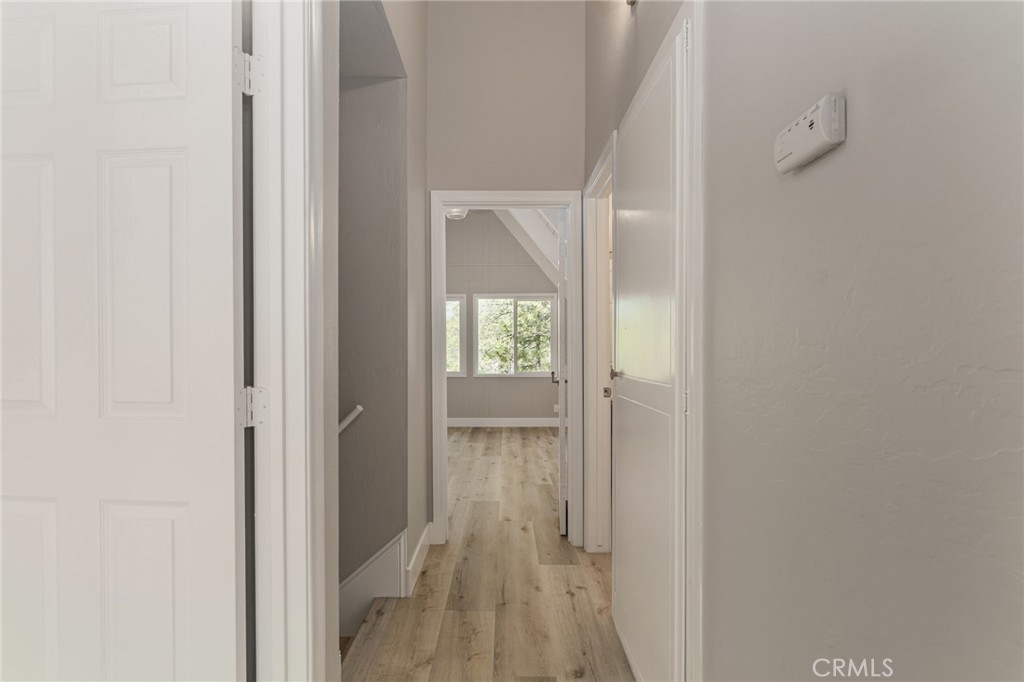 1106 Grass Valley Road Lake Arrowhead, CA 92352 - Photo 36 of 57 a view of an entryway with wooden floor