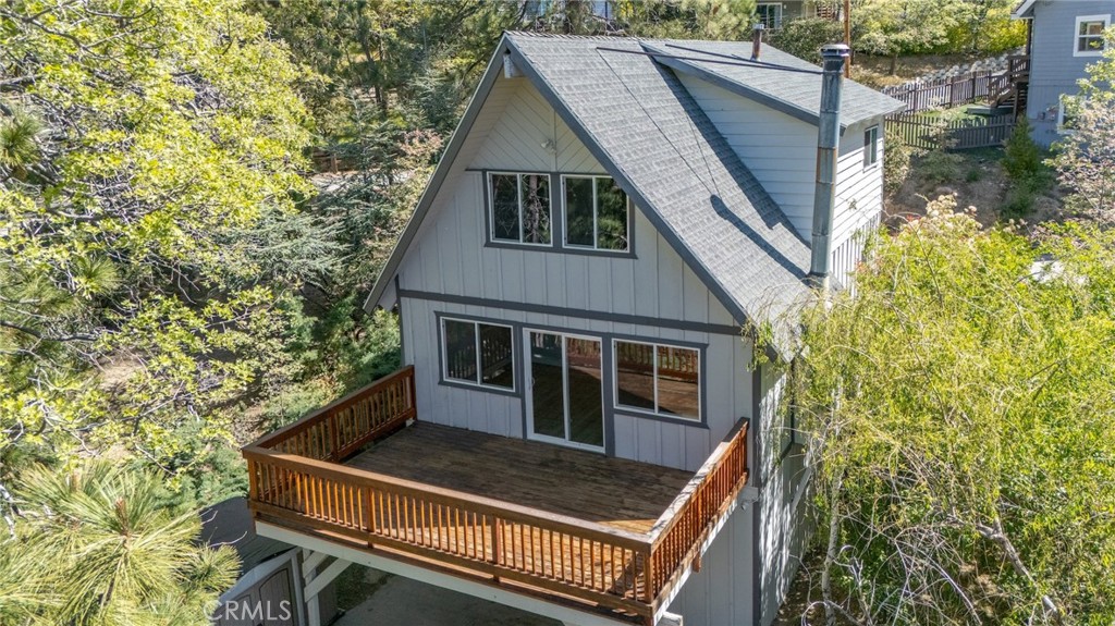 1106 Grass Valley Road Lake Arrowhead, CA 92352 - Photo 55 of 57 a view of house with a yard and furniture