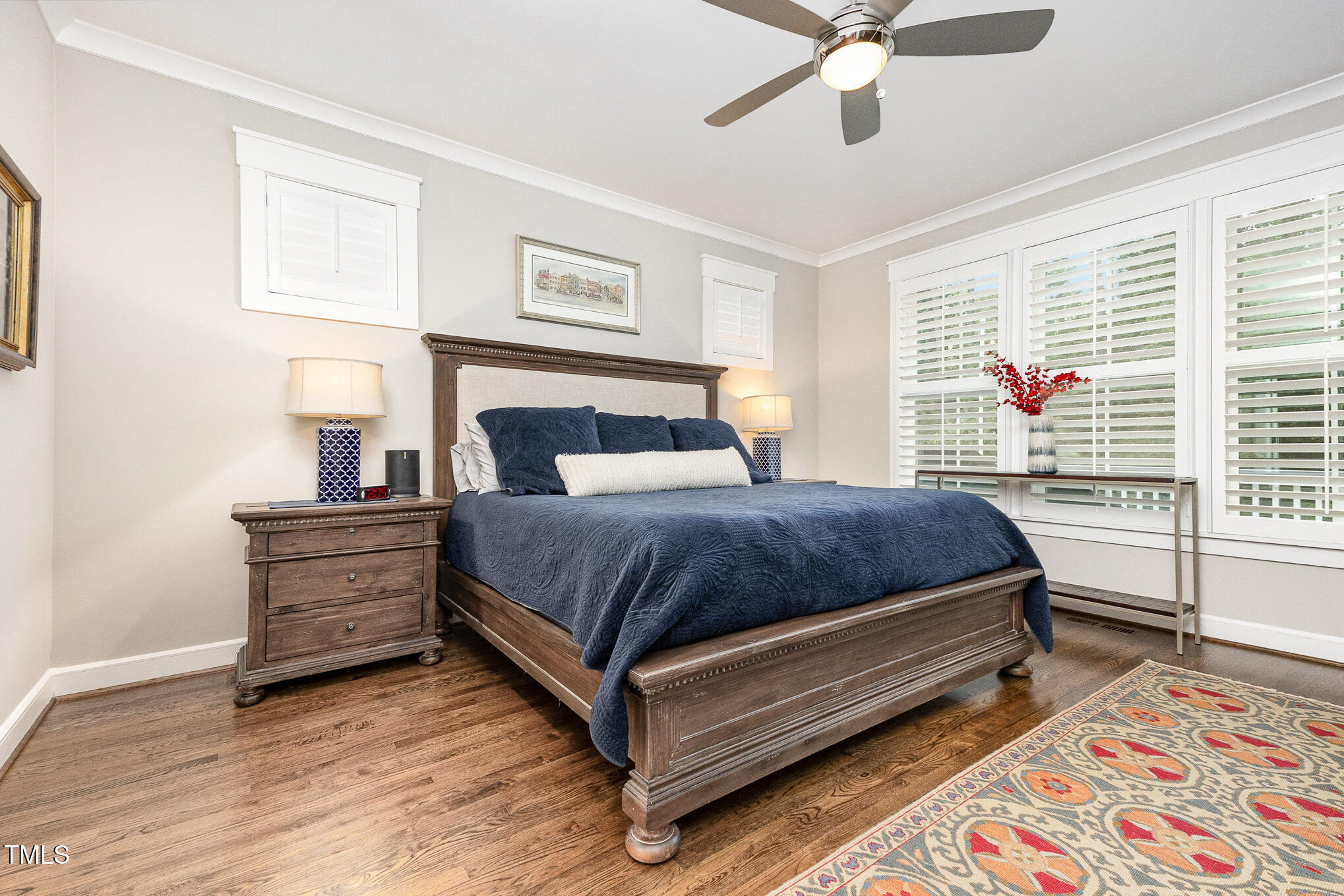 3608 Dixon Road Durham, NC 27707 - Photo 4 of 32 a bedroom with a bed and window