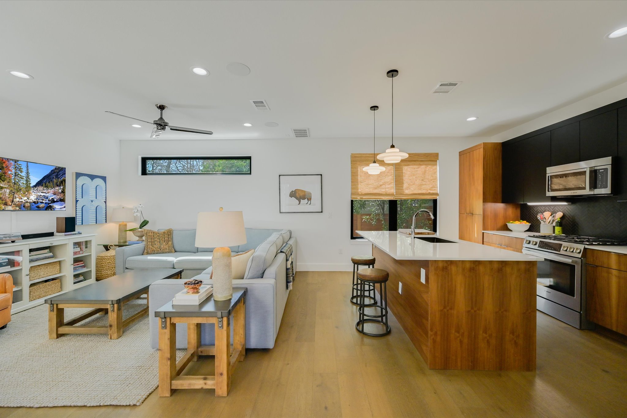 907 Redd Street, Unit 2 Austin, TX 78745 - Photo 10 of 20 Living area featuring light wood finished floors, recessed lighting, and a ceiling fan