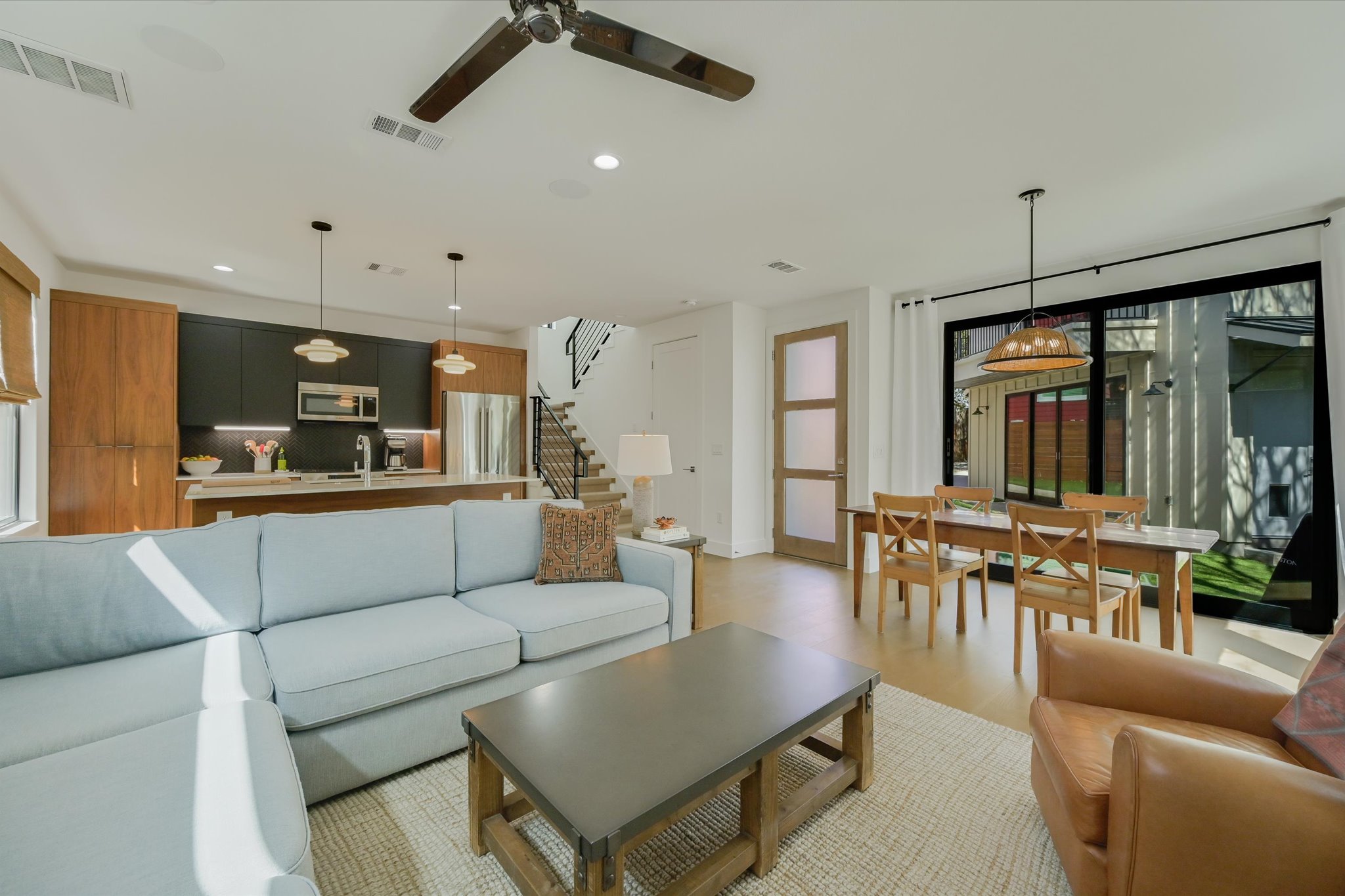 907 Redd Street, Unit 2 Austin, TX 78745 - Photo 5 of 20 The gorgeous living/dining and kitchen area of the main home. This spacious and open space offers room to relax or entertain.