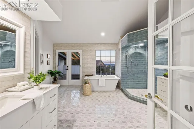 a very nice looking room with a large window and dining table