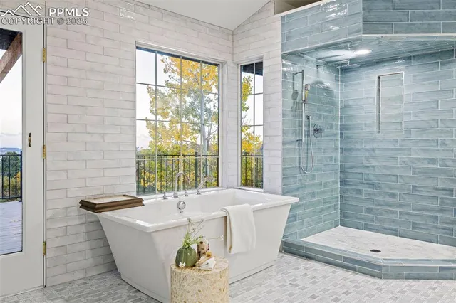 a bathroom with a bathtub and sink