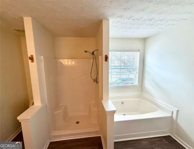 a bathroom with a bathtub
